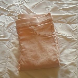 Baby pink skinny jeans